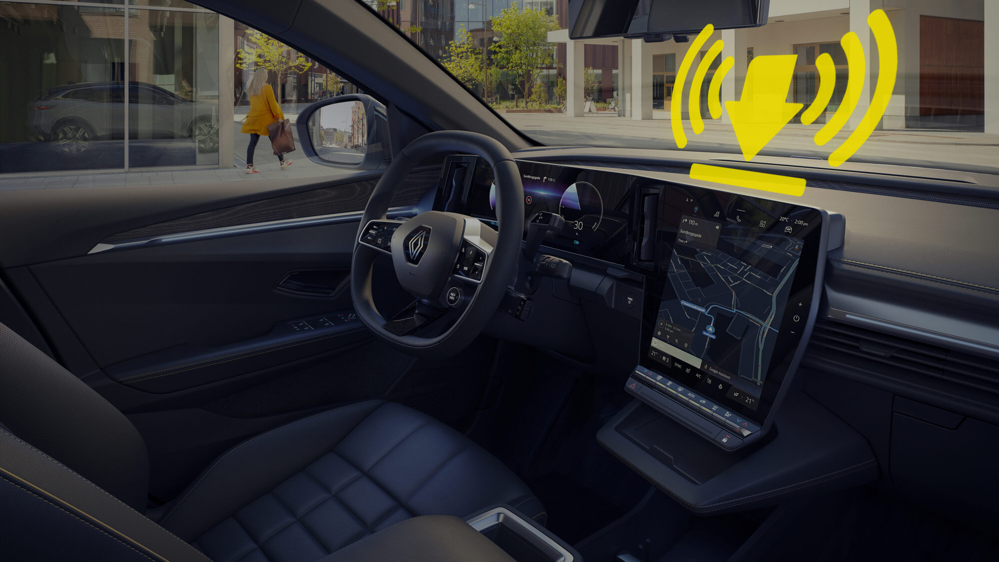 Visiškai elektrinio Renault MEGANE E-TECH Electric interjeras, matomas vairas, prietaisų skydas ir OpenR ekranas, geltonas grafinis simbolis vaizduoja nuotolinio programinės įrangos atnaujinimo funkciją
